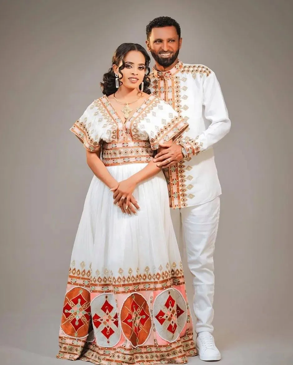 Colorful Modern Ethiopian Outfit: Stylish Habesha Couples Outfit for Weddings